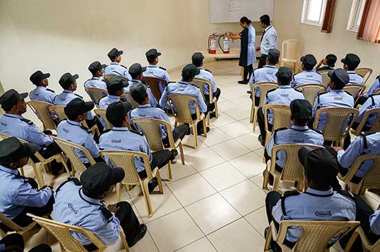 security guards attending a training session on how to handle fire extinguisher